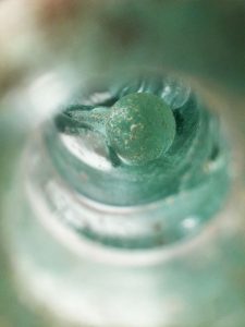 Glass moon bottle photograph
